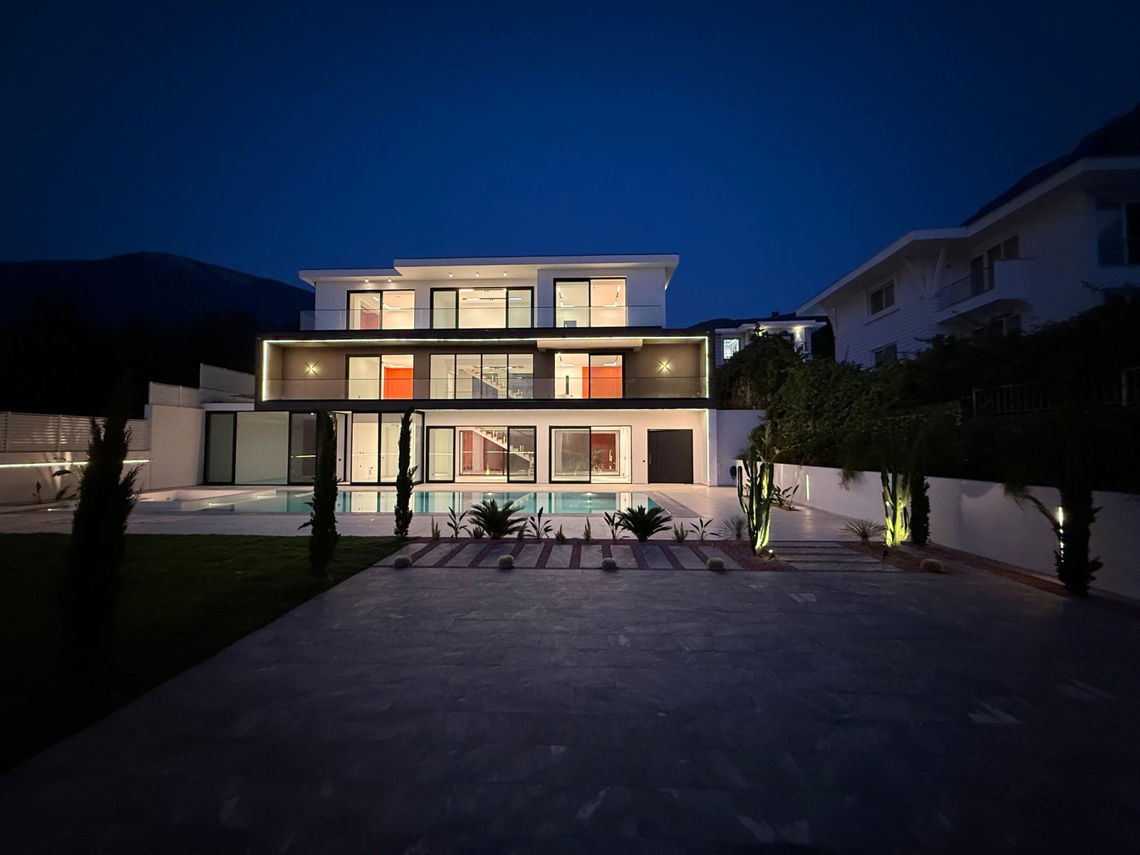 Modern villa in Ovacık Fethiye with private pool, fire pit lounge, and landscaped garden