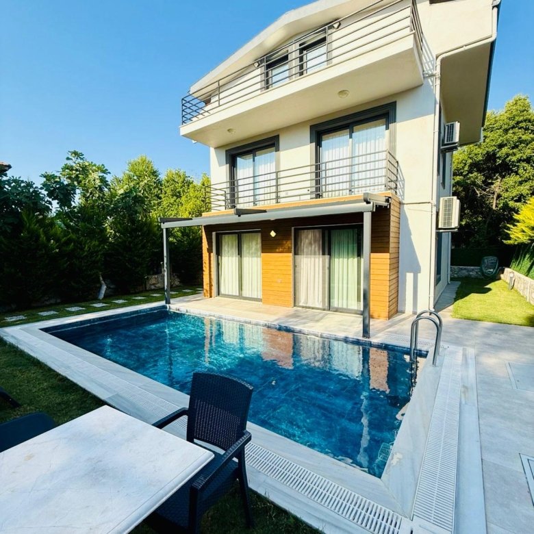 Modern bedroom with clean design and stylish furniture.