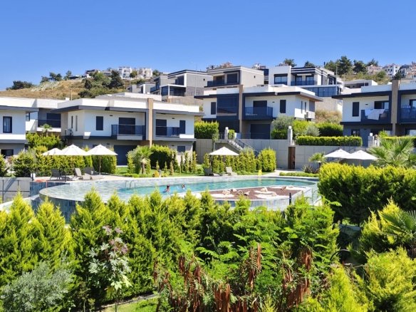 Luxury 3-bedroom villa for sale Kuşadası in Karaova with private garden and communal pool