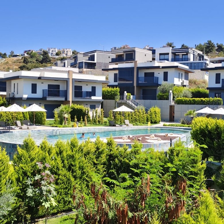 Luxury 3-bedroom villa for sale Kuşadası in Karaova with private garden and communal pool