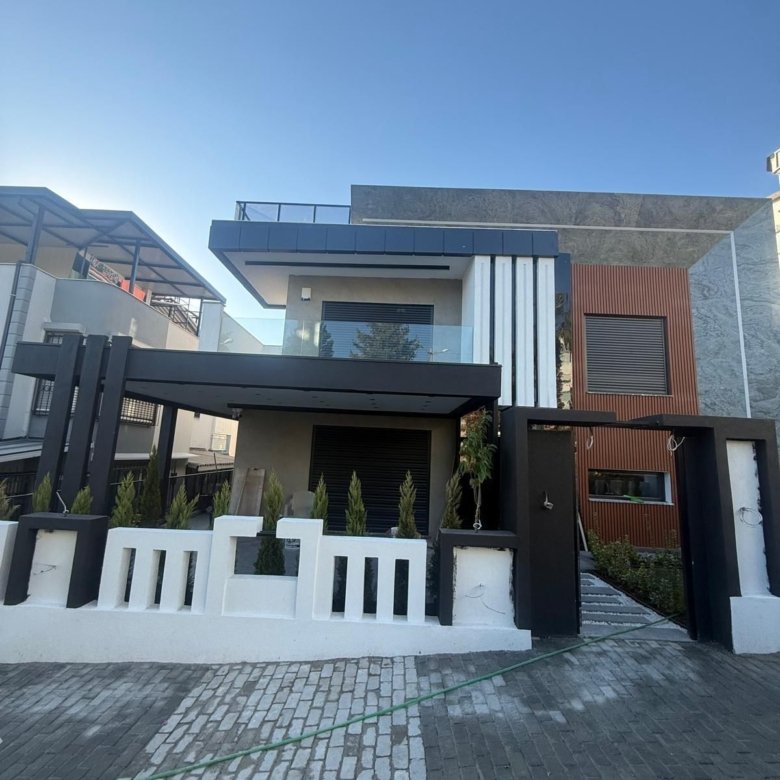 Luxury 3+1 triplex villa for sale in Kuşadası with private pool and panoramic sea view.